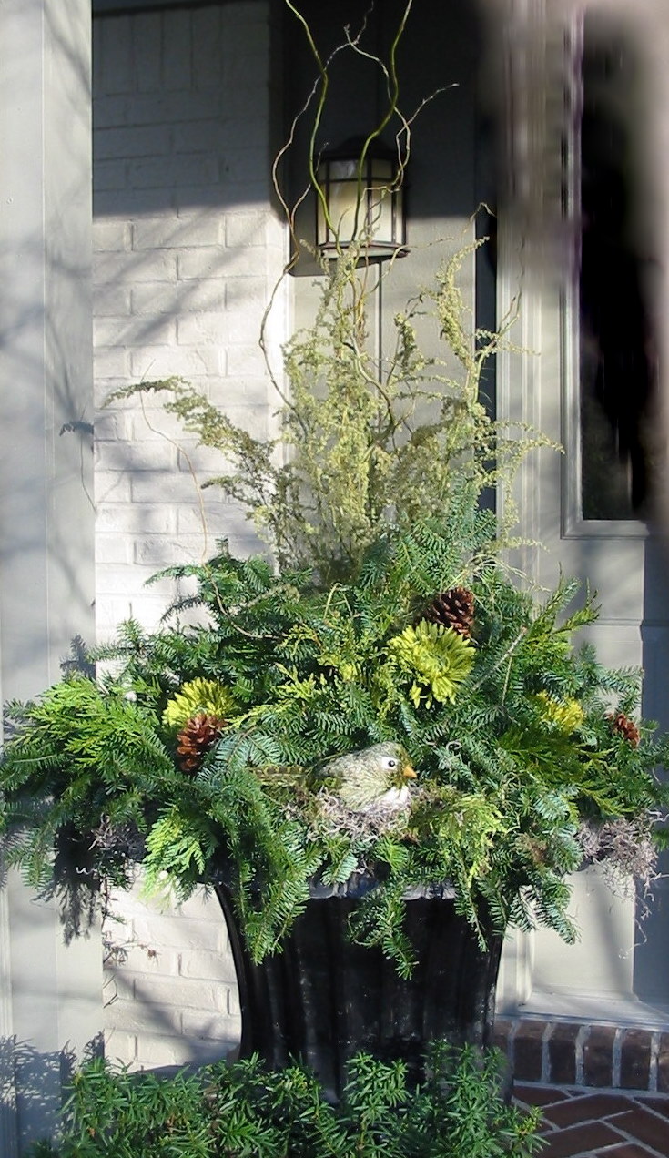 Seasonal container arrangement at a home entry